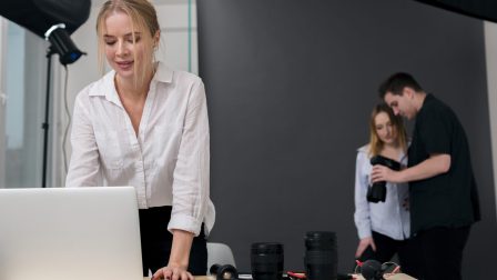woman-working-laptop-people-looking-photos